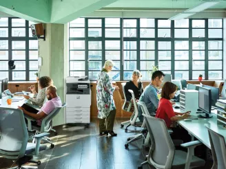 Printer-office-people working at desks
