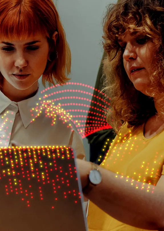 Woman using a tablet in a fashion retail shop 